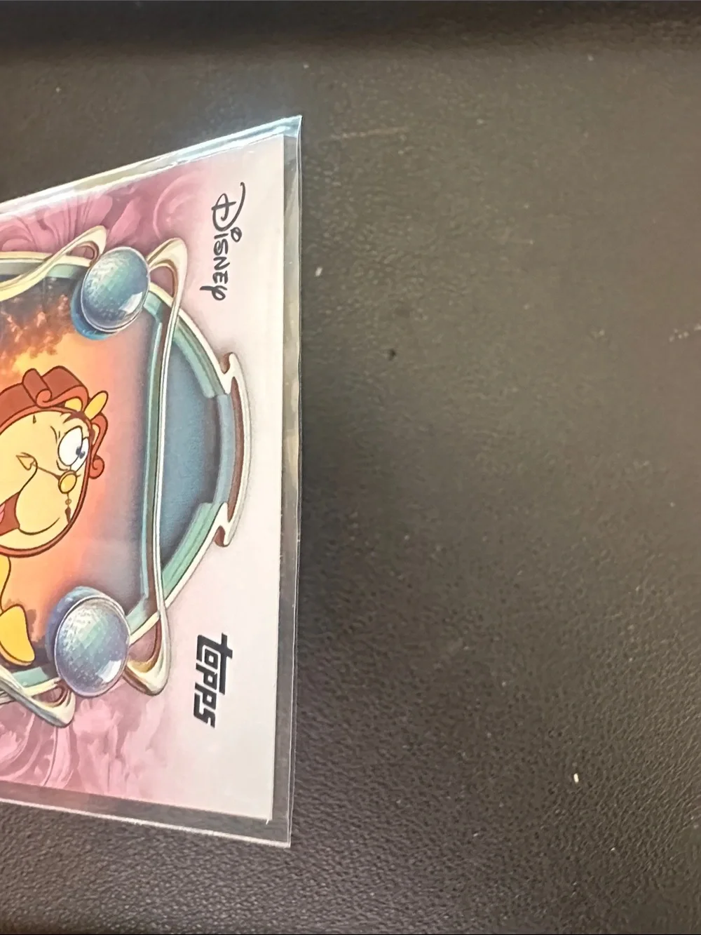 Topps Disney Cogsworth Trading Card - Pink and Orange Accents